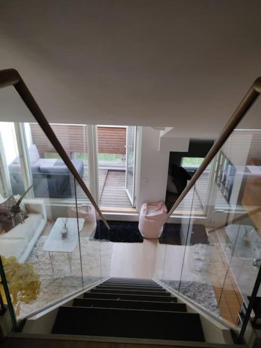 Huoneisto Cozy Penthouse Loft